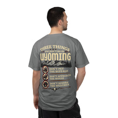 Wyoming Funny Roadtrip T-Shirt — "Three Things You Don’t Do in Wyoming" Adventure Tee