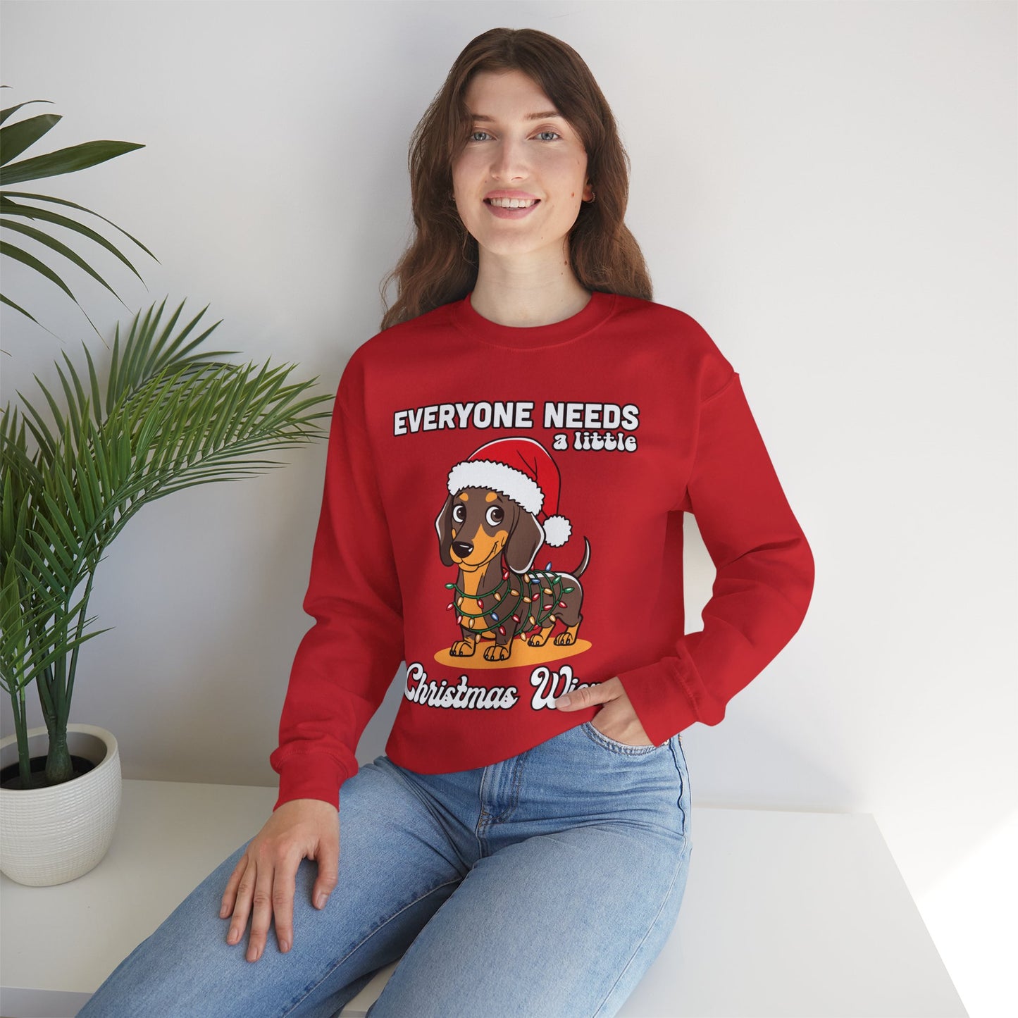 Everyone needs a little Christmas weiner - Unisex Heavy Blend™ Crewneck Sweatshirt