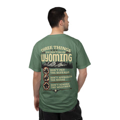 Wyoming Funny Roadtrip T-Shirt — "Three Things You Don’t Do in Wyoming" Adventure Tee
