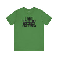 I Still Run Better Than The Government - Unisex Short Sleeve Tee | Amputee Awareness,Limb Awareness,Leg Amputee,Gift For Him,Gift For Her