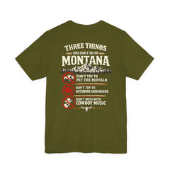 Montana Rules Tee - “3 Things You Don’t Do in Montana: Don’t Pet the Buffalo, Outdrink Canadians, Mess with Cowboy Music”