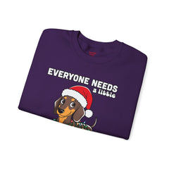 Everyone needs a little Christmas weiner - Unisex Heavy Blend™ Crewneck Sweatshirt