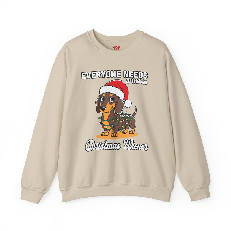 Everyone needs a little Christmas weiner - Unisex Heavy Blend™ Crewneck Sweatshirt