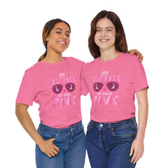 In October We Wear Pink - Graphic Unisex Jersey Short Sleeve Tee