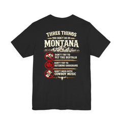 Montana Rules Tee - “3 Things You Don’t Do in Montana: Don’t Pet the Buffalo, Outdrink Canadians, Mess with Cowboy Music”