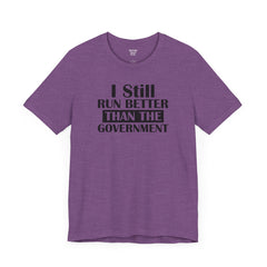 I Still Run Better Than The Government - Unisex Short Sleeve Tee | Amputee Awareness,Limb Awareness,Leg Amputee,Gift For Him,Gift For Her