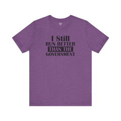 I Still Run Better Than The Government - Unisex Short Sleeve Tee | Amputee Awareness,Limb Awareness,Leg Amputee,Gift For Him,Gift For Her