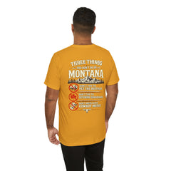Montana Rules Tee - “3 Things You Don’t Do in Montana: Don’t Pet the Buffalo, Outdrink Canadians, Mess with Cowboy Music”