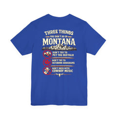 Montana Rules Tee - “3 Things You Don’t Do in Montana: Don’t Pet the Buffalo, Outdrink Canadians, Mess with Cowboy Music”
