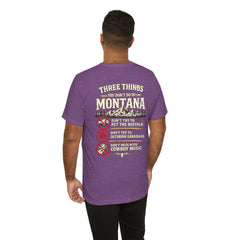 Montana Rules Tee - “3 Things You Don’t Do in Montana: Don’t Pet the Buffalo, Outdrink Canadians, Mess with Cowboy Music”