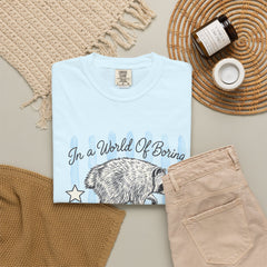Be A Timothy T-Shirt — Retro Raccoon Graphic Tee ("In a World of Boring")
