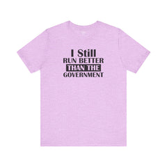 I Still Run Better Than The Government - Unisex Short Sleeve Tee | Amputee Awareness,Limb Awareness,Leg Amputee,Gift For Him,Gift For Her