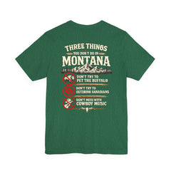 Montana Rules Tee - “3 Things You Don’t Do in Montana: Don’t Pet the Buffalo, Outdrink Canadians, Mess with Cowboy Music”