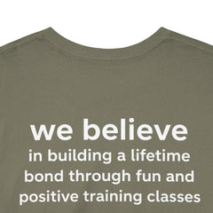 Dog Trainer T‑Shirt — "dog trainer." Front Logo with "we believe..." Positive Training Back Text