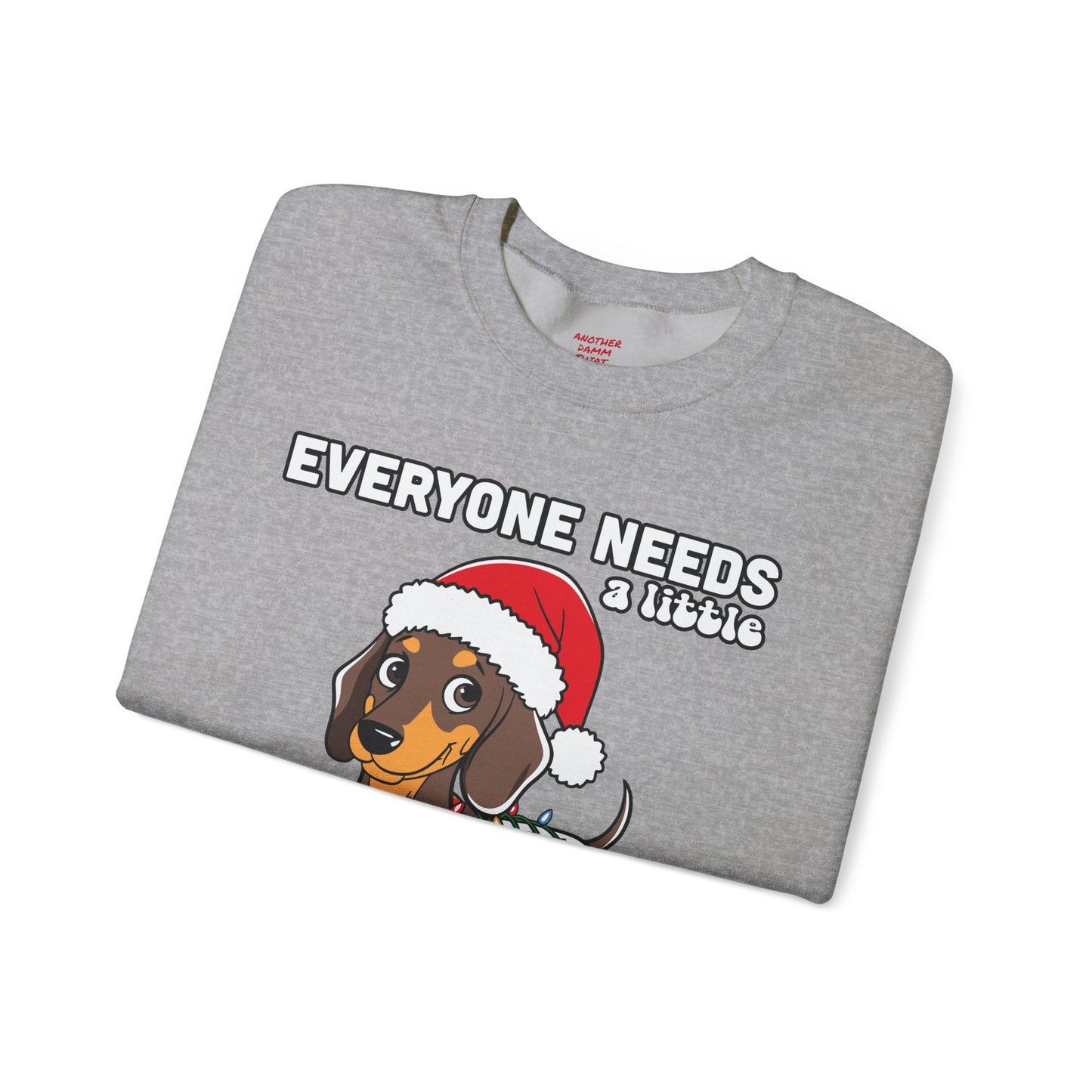 Everyone needs a little Christmas weiner - Unisex Heavy Blend™ Crewneck Sweatshirt