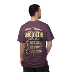 Wyoming Funny Roadtrip T-Shirt — "Three Things You Don’t Do in Wyoming" Adventure Tee