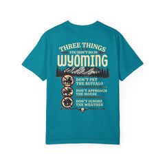 Wyoming Funny Roadtrip T-Shirt — "Three Things You Don’t Do in Wyoming" Adventure Tee