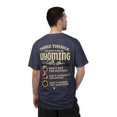 Wyoming Funny Roadtrip T-Shirt — "Three Things You Don’t Do in Wyoming" Adventure Tee