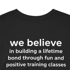 Dog Trainer T‑Shirt — "dog trainer." Front Logo with "we believe..." Positive Training Back Text