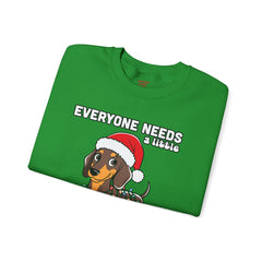 Everyone needs a little Christmas weiner - Unisex Heavy Blend™ Crewneck Sweatshirt