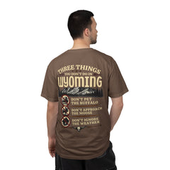Wyoming Funny Roadtrip T-Shirt — "Three Things You Don’t Do in Wyoming" Adventure Tee