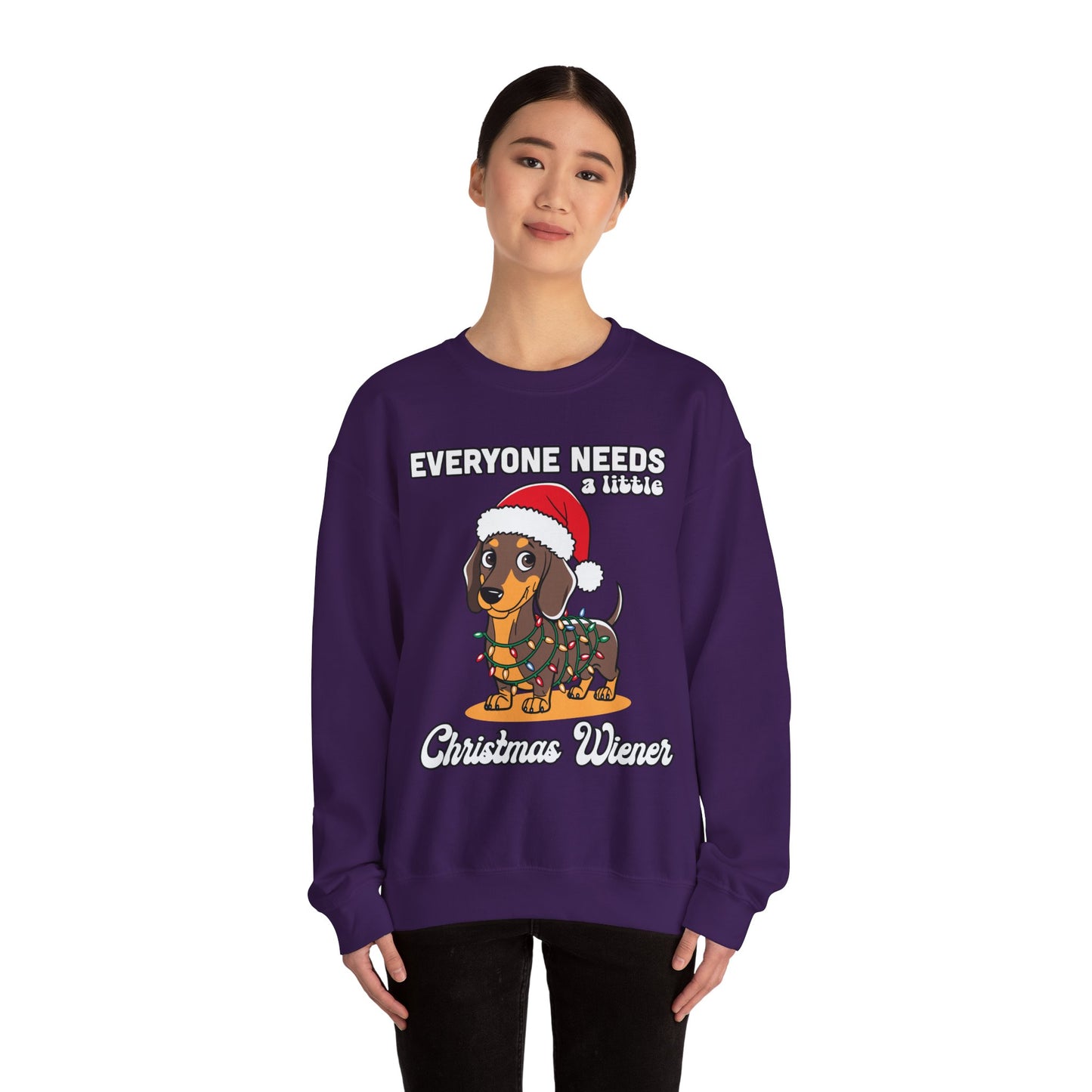 Everyone needs a little Christmas weiner - Unisex Heavy Blend™ Crewneck Sweatshirt