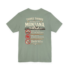 Montana Rules Tee - “3 Things You Don’t Do in Montana: Don’t Pet the Buffalo, Outdrink Canadians, Mess with Cowboy Music”