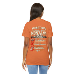 Montana Rules Tee - “3 Things You Don’t Do in Montana: Don’t Pet the Buffalo, Outdrink Canadians, Mess with Cowboy Music”