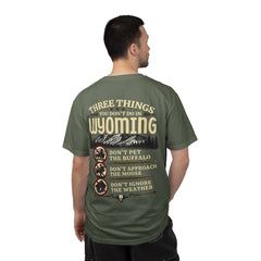 Wyoming Funny Roadtrip T-Shirt — "Three Things You Don’t Do in Wyoming" Adventure Tee