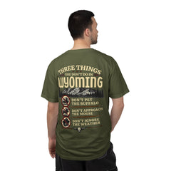 Wyoming Funny Roadtrip T-Shirt — "Three Things You Don’t Do in Wyoming" Adventure Tee
