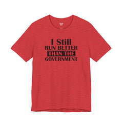 I Still Run Better Than The Government - Unisex Short Sleeve Tee | Amputee Awareness,Limb Awareness,Leg Amputee,Gift For Him,Gift For Her