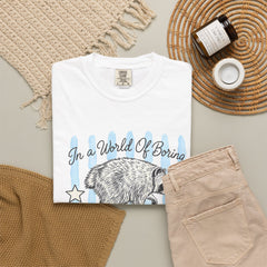 Be A Timothy T-Shirt — Retro Raccoon Graphic Tee ("In a World of Boring")
