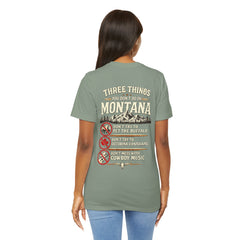 Montana Rules Tee - “3 Things You Don’t Do in Montana: Don’t Pet the Buffalo, Outdrink Canadians, Mess with Cowboy Music”