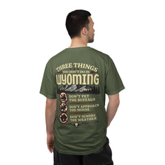 Wyoming Funny Roadtrip T-Shirt — "Three Things You Don’t Do in Wyoming" Adventure Tee