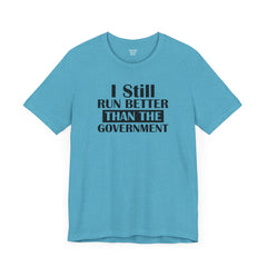 I Still Run Better Than The Government - Unisex Short Sleeve Tee | Amputee Awareness,Limb Awareness,Leg Amputee,Gift For Him,Gift For Her