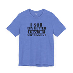 I Still Run Better Than The Government - Unisex Short Sleeve Tee | Amputee Awareness,Limb Awareness,Leg Amputee,Gift For Him,Gift For Her