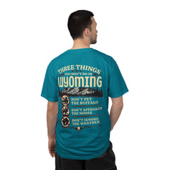 Wyoming Funny Roadtrip T-Shirt — "Three Things You Don’t Do in Wyoming" Adventure Tee