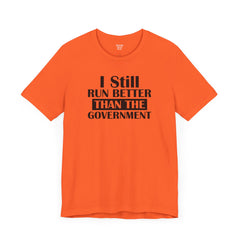 I Still Run Better Than The Government - Unisex Short Sleeve Tee | Amputee Awareness,Limb Awareness,Leg Amputee,Gift For Him,Gift For Her