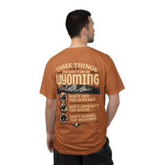 Wyoming Funny Roadtrip T-Shirt — "Three Things You Don’t Do in Wyoming" Adventure Tee