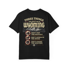 Wyoming Funny Roadtrip T-Shirt — "Three Things You Don’t Do in Wyoming" Adventure Tee