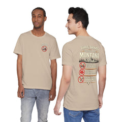 Montana Rules Tee - “3 Things You Don’t Do in Montana: Don’t Pet the Buffalo, Outdrink Canadians, Mess with Cowboy Music”