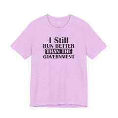 I Still Run Better Than The Government - Unisex Short Sleeve Tee | Amputee Awareness,Limb Awareness,Leg Amputee,Gift For Him,Gift For Her