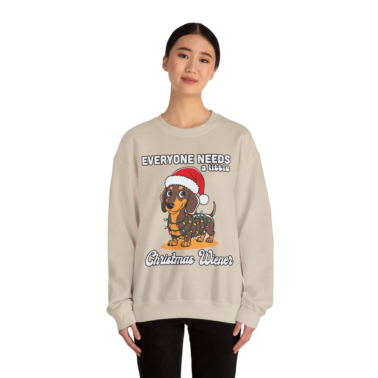 Everyone needs a little Christmas weiner - Unisex Heavy Blend™ Crewneck Sweatshirt