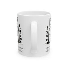 Espresso yourself, just not before I've had my coffee. - Ceramic Mug 11oz / Cat making a 'shh' gesture with one paw / paw holds a coffee mug
